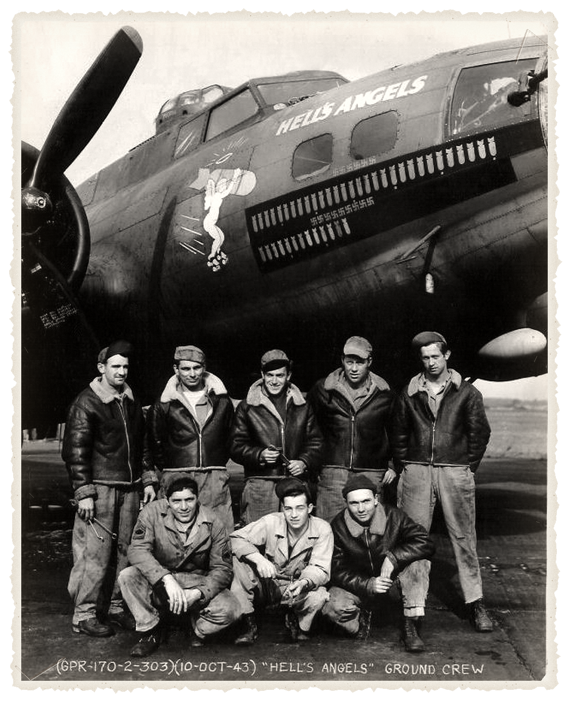 archival WWII B-17 aircraft with ground crew