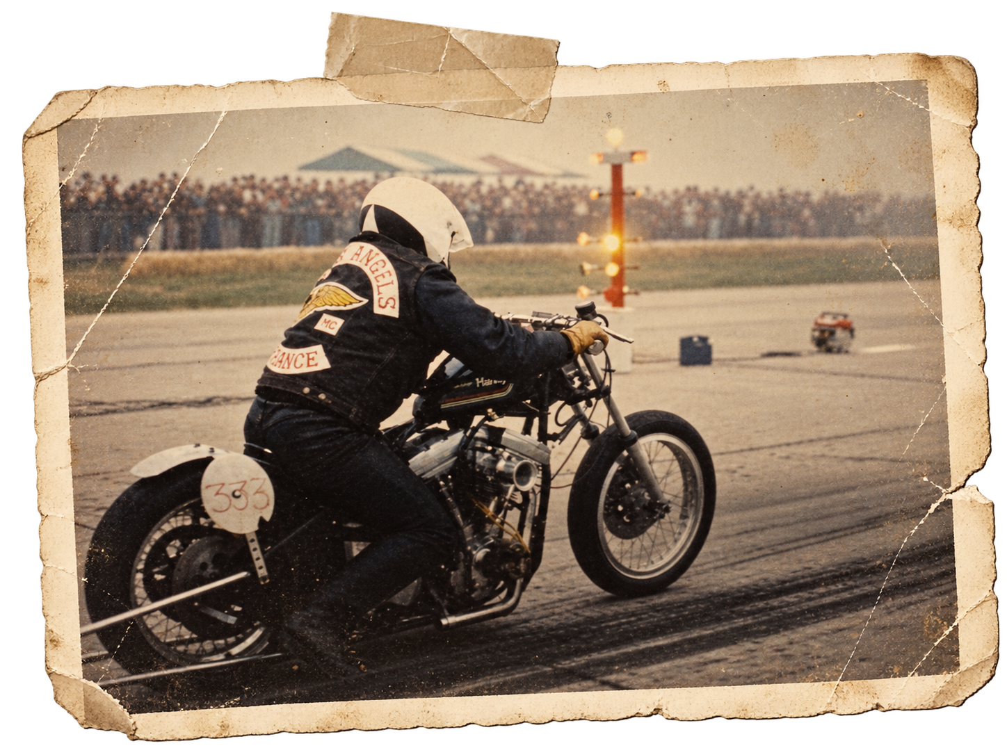 archival-style photograph of motorcycle racer on drag strip